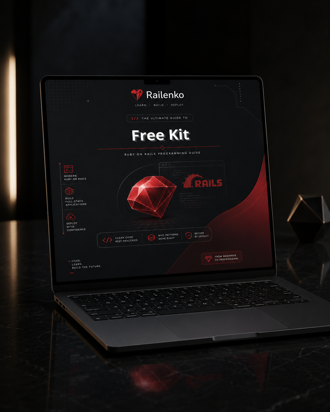 Laptop displaying a Railkeno free kit on a dark surface